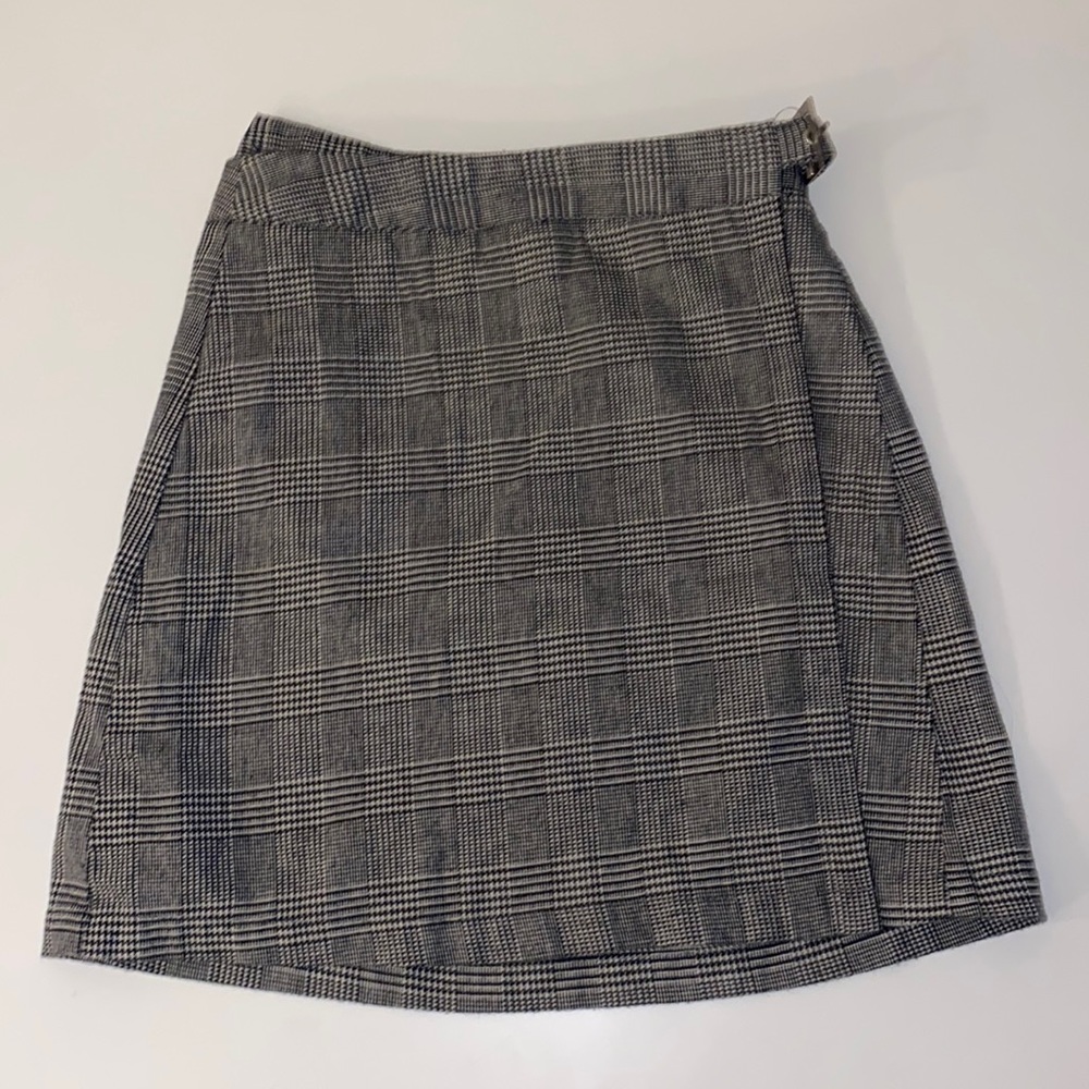 Brand Melville plaid wrap skirt. Adjustable with 3 buttons and belt like clip